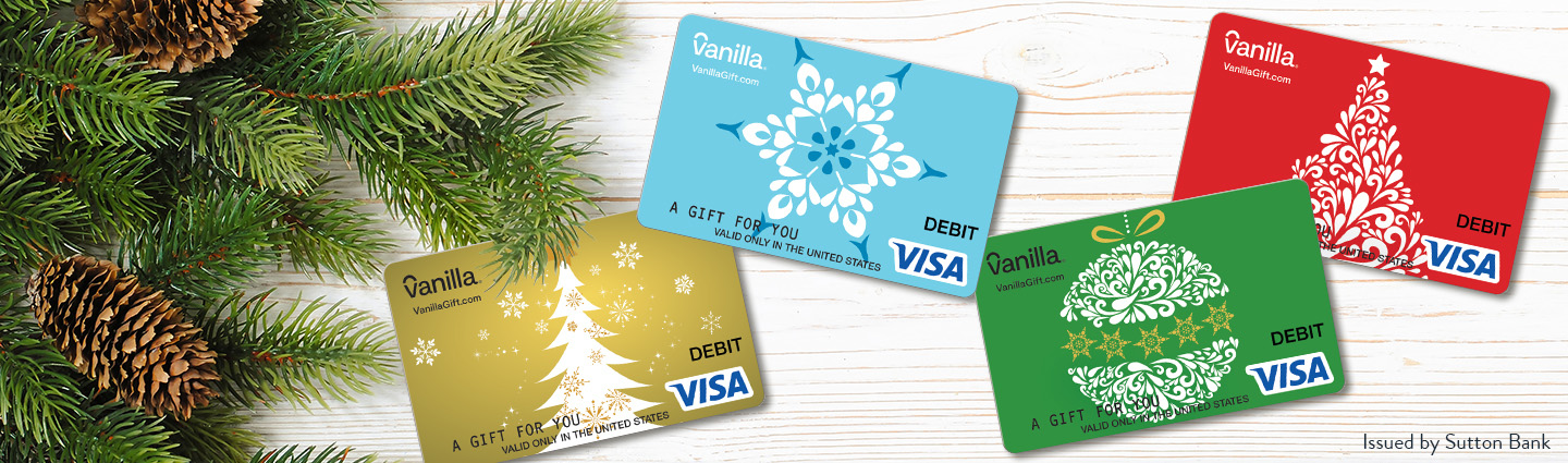 Gift cards with holiday designs on a wooden background.