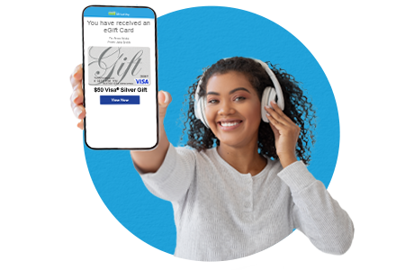 Smiling woman holding eGift card on her cell phone